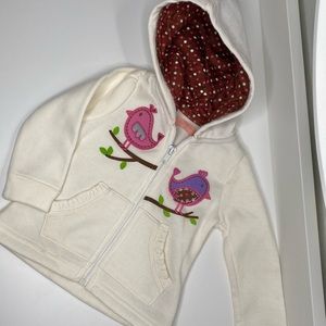 New Jacket never used cream color with brown pink and cream polkadots the hoodie